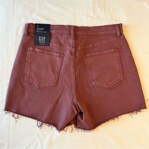 Coral colored, high waist denim shorts